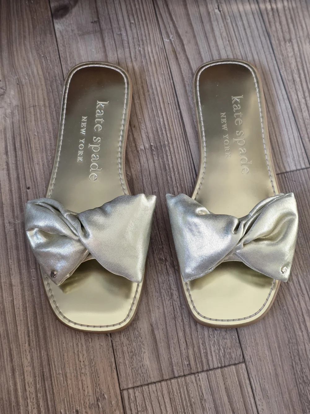 kate spade New York Metallic Gold Bow Slide Sandals